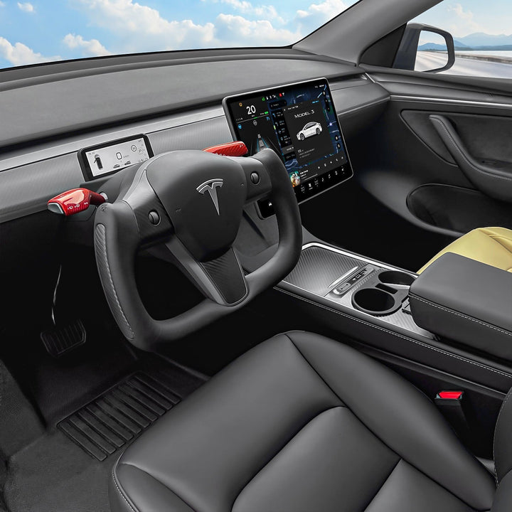Sea Dragon Dreams carbon fiber yoke steering wheel installed in a Tesla Model 3 or Model Y interior
