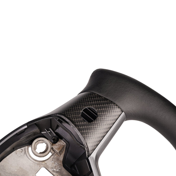 Sea Dragon Dreams carbon fiber yoke steering wheel detail for Tesla Model 3 and Model Y with black leather grip