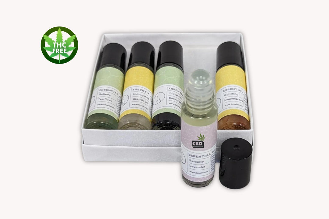 Sea Dragon Dreams CBD essential oil roll-on gift set with five crystal-infused aromatherapy bottles in a white box.