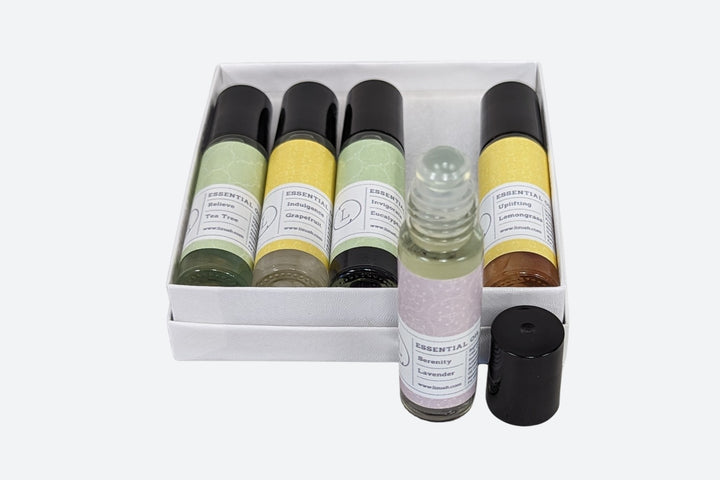 Sea Dragon Dreams CBD essential oil roll-on gift set with five aromatherapy scents and crystals in a white box
