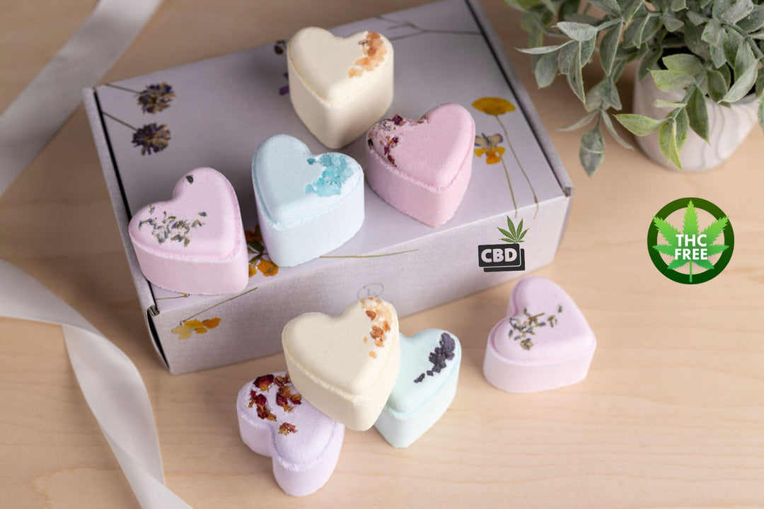 Sea Dragon Dreams CBD lavender bath bomb gift set featuring eight handmade heart-shaped bath bombs in pastel colours.