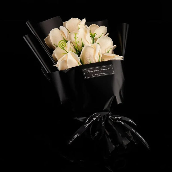 Sea Dragon Dreams champagne soap rose bouquet wrapped in elegant black paper with a decorative ribbon