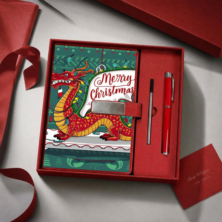 Sea Dragon Dreams Christmas notebook gift set with red metal pen and festive dragon illustration in a presentation box