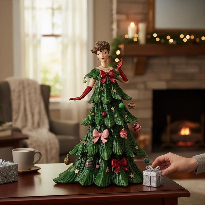 Sea Dragon Dreams Mark Roberts Christmas Tree Fashion Lady figurine with festive ornaments on a wooden table