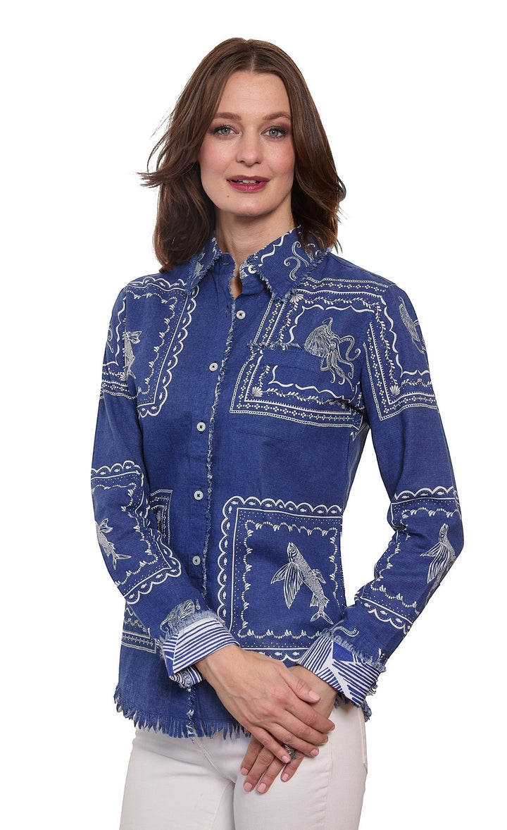 Sea Dragon Dreams coastal blouse in blue with white sea life print, featuring a button-down front and frayed hem.