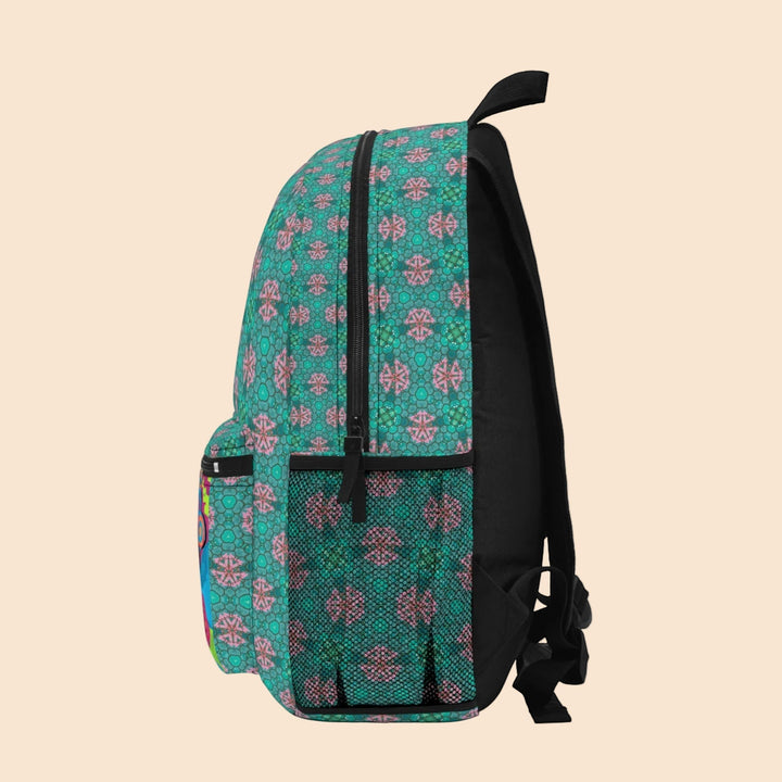 Sea Dragon Dreams backpack featuring a vibrant teal and pink abstract geometric art pattern with side mesh pocket