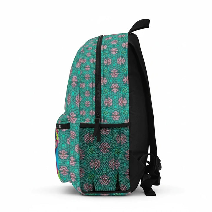 Sea Dragon Dreams backpack featuring a vibrant teal and pink geometric abstract art pattern with side mesh pockets.