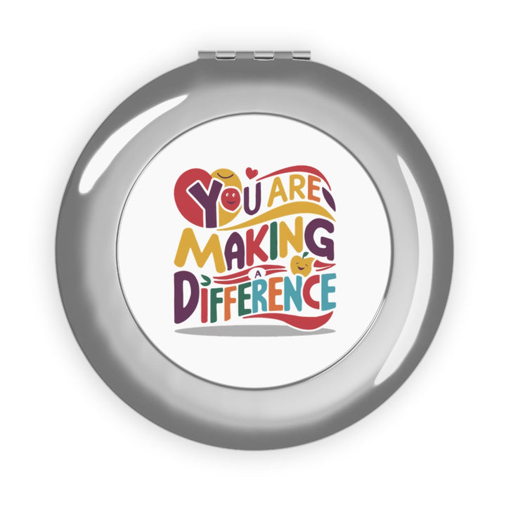 Sea Dragon Dreams round metal compact travel mirror with You Are Making a Difference colorful typography design