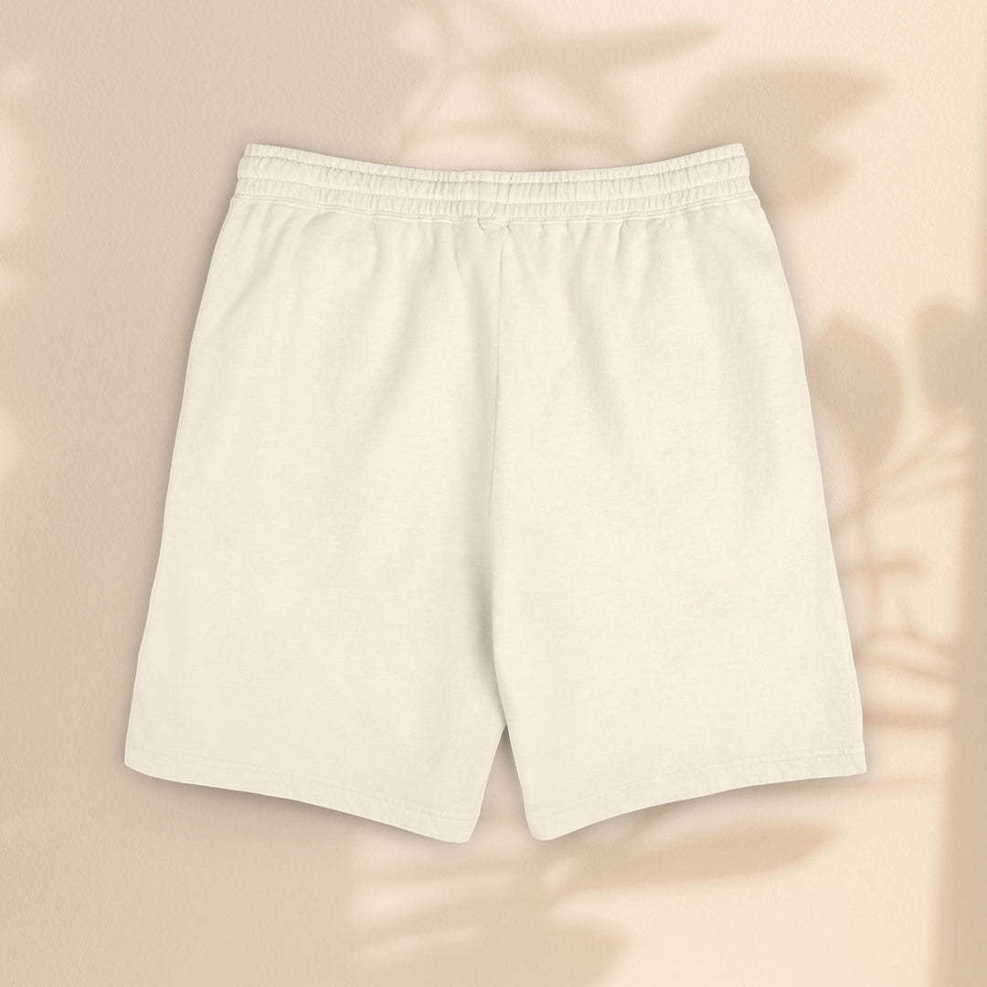 Sea Dragon Dreams lightweight fleece sweat shorts in a solid cream color with an elastic waistband and relaxed fit.