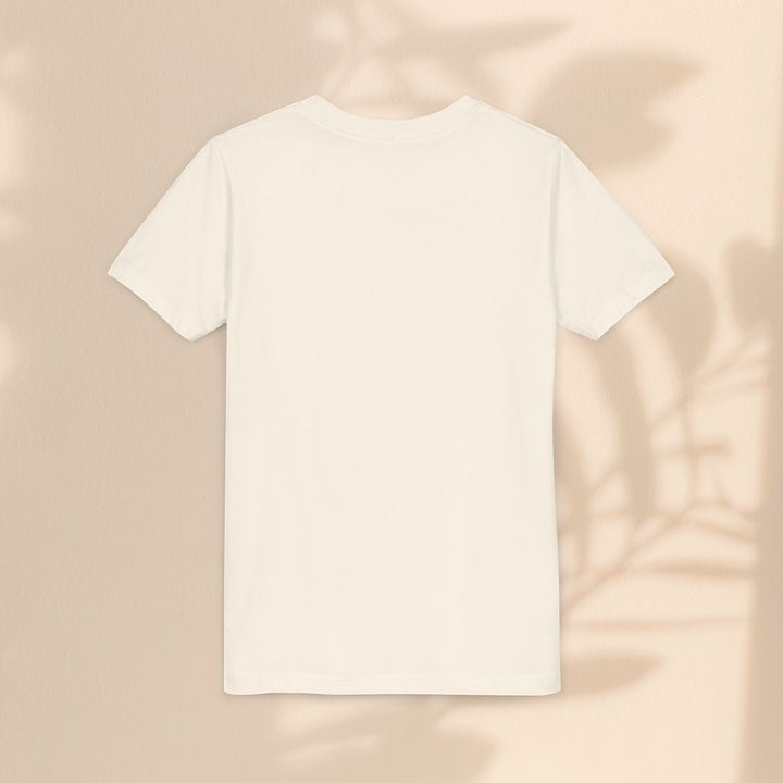 Sea Dragon Dreams youth t-shirt in cream cotton blend, back view, displayed against a soft neutral background.