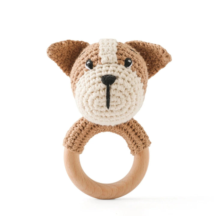 Sea Dragon Dreams crochet puppy rattle with a soft cotton animal head and a smooth natural wooden teething ring