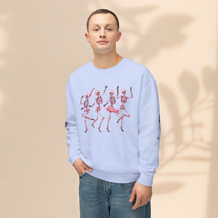 Sea Dragon Dreams light blue crewneck sweatshirt featuring a pink dancing skeletons graphic on a man in blue jeans