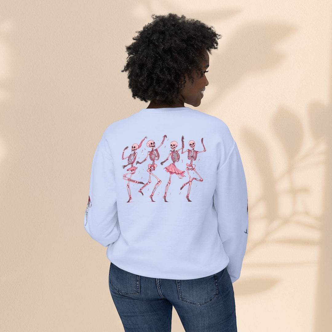 Sea Dragon Dreams light blue crewneck sweatshirt featuring a back print of dancing skeletons in pink ballet outfits.