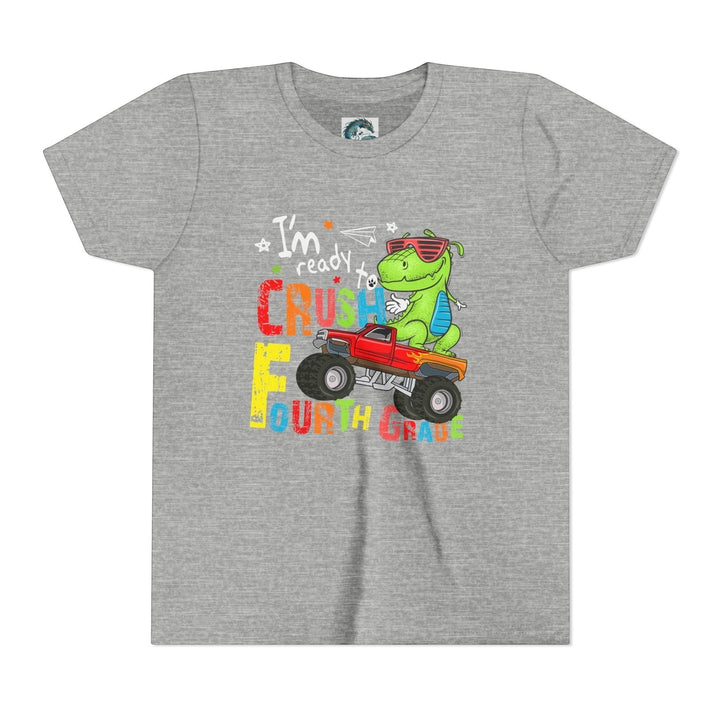 Sea Dragon Dreams grey kids t-shirt featuring a cartoon dinosaur driving a monster truck with Fourth Grade text