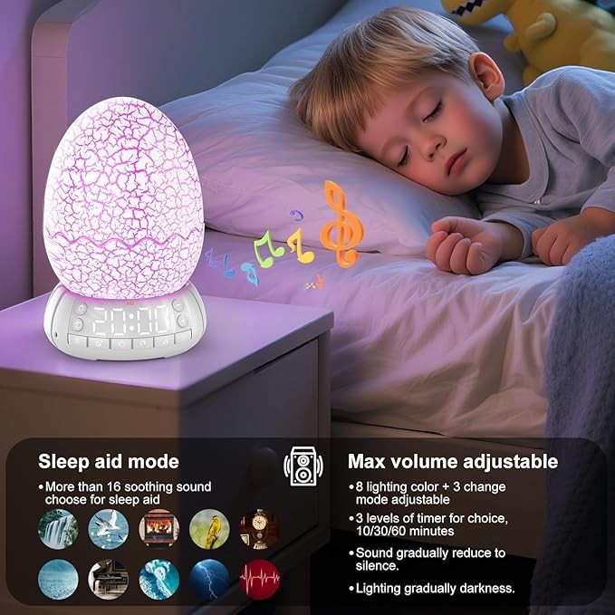 Sea Dragon Dreams dragon egg alarm clock with glowing purple light and Bluetooth speaker on a child's bedside table.
