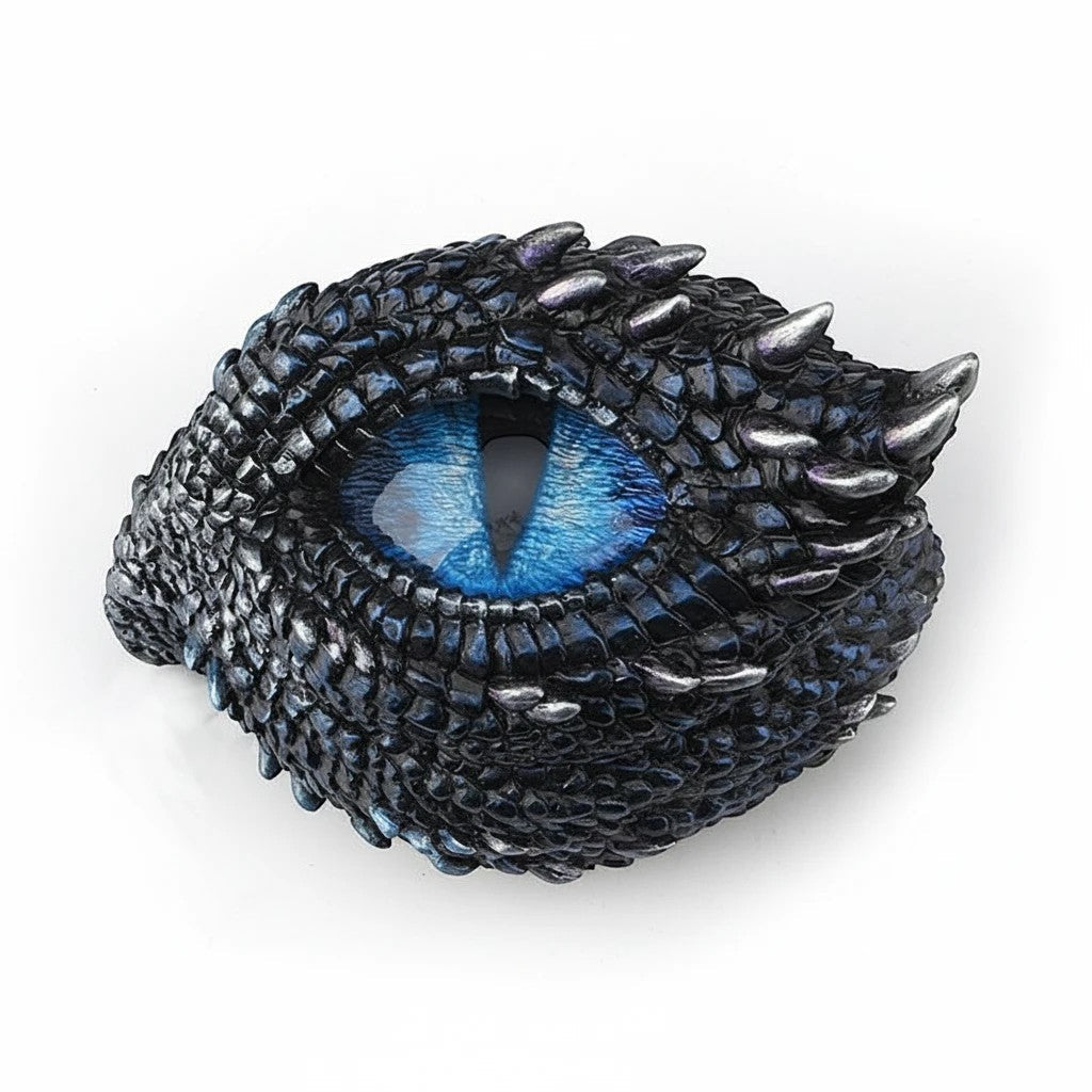 Sea Dragon Dreams polystone trinket box featuring a detailed blue dragon eye surrounded by dark thorny scales.