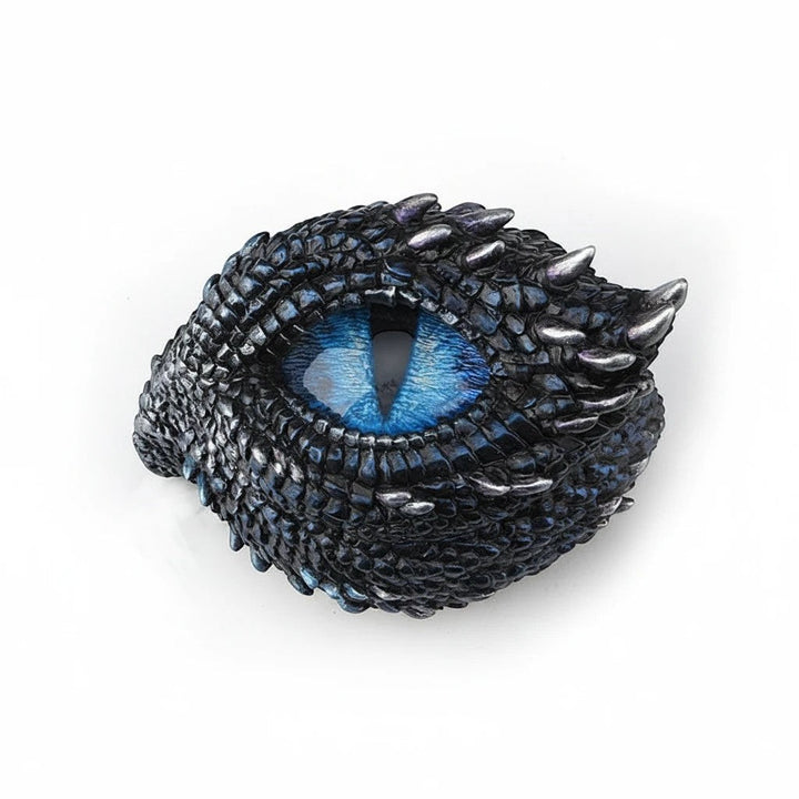 Sea Dragon Dreams polystone trinket box featuring a detailed blue dragon eye surrounded by dark thorny scales