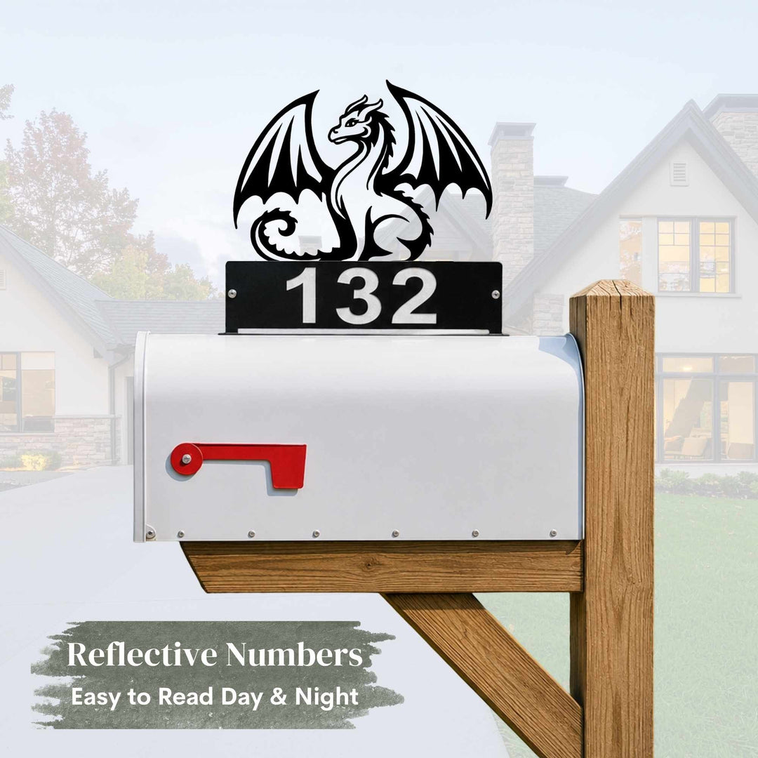 Sea Dragon Dreams black steel dragon mailbox topper with personalized reflective house numbers on a white mailbox.