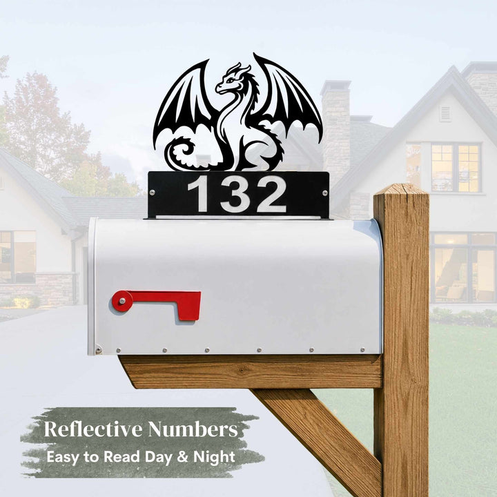 Sea Dragon Dreams black steel dragon mailbox topper with personalized reflective house numbers on a white mailbox.