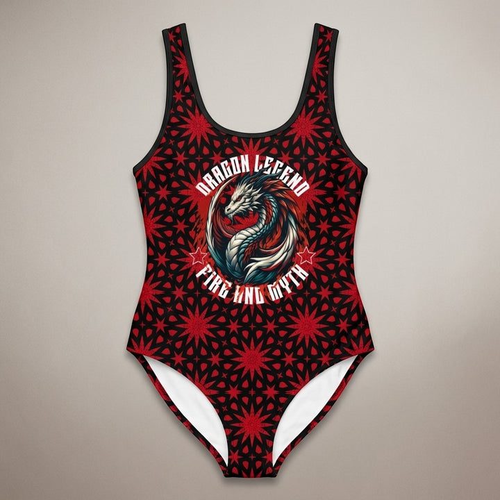 Sea Dragon Dreams one-piece swimsuit featuring a red and black dragon graphic, scoop neck, and geometric pattern.