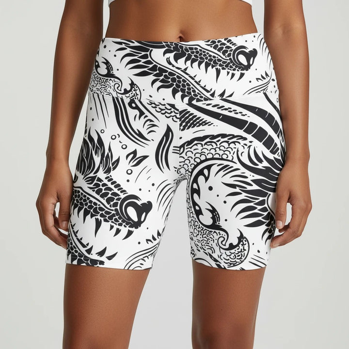 Sea Dragon Dreams women's workout shorts featuring a black and white dragon print, made from durable polyester.