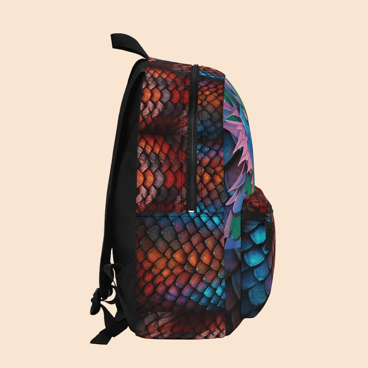 Sea Dragon Dreams backpack featuring a vibrant dragon scale pattern in red and blue with a side profile view.