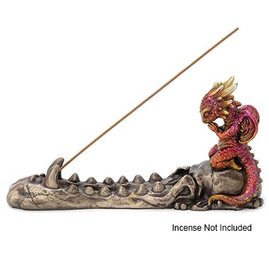 Sea Dragon Dreams cold cast bronze incense burner featuring a ruby and gold baby dragon perched on a skull