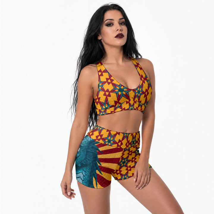 Model wearing a Sea Dragon Dreams yellow and red dragon-print sports bra and matching athletic shorts