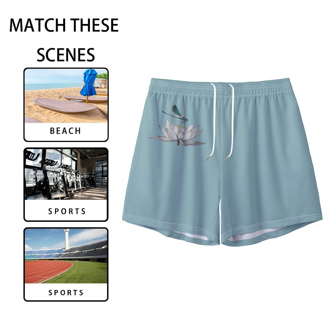 Sea Dragon Dreams men's light blue polyester swim shorts featuring a dragonfly and lotus flower print.