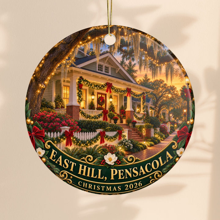 Sea Dragon Dreams ceramic Christmas ornament featuring a festive East Hill Pensacola home scene dated 2026.