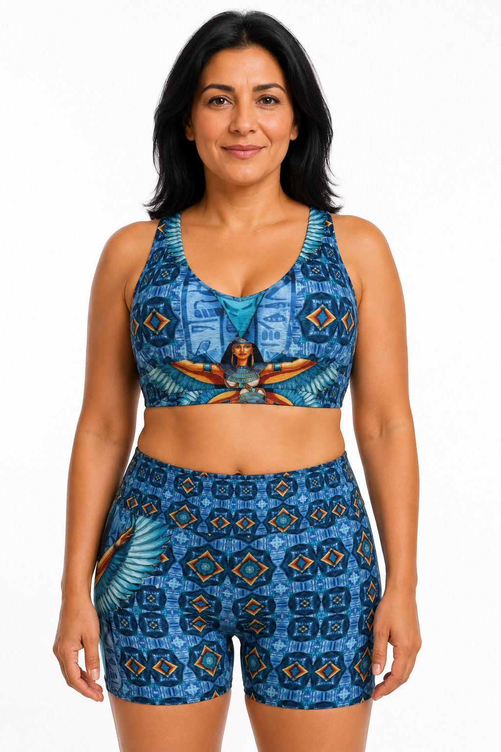 Sea Dragon Dreams sports bra and high-waisted shorts set featuring blue Egyptian goddess print and geometric patterns.