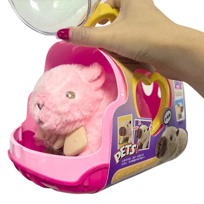 Sea Dragon Dreams electric pink plush capybara toy inside a portable pink plastic carrier case