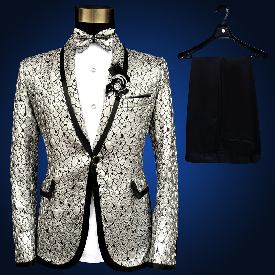 Sea Dragon Dreams four-piece tuxedo set with a silver and black scale-patterned blazer, vest, bowtie, and trousers.