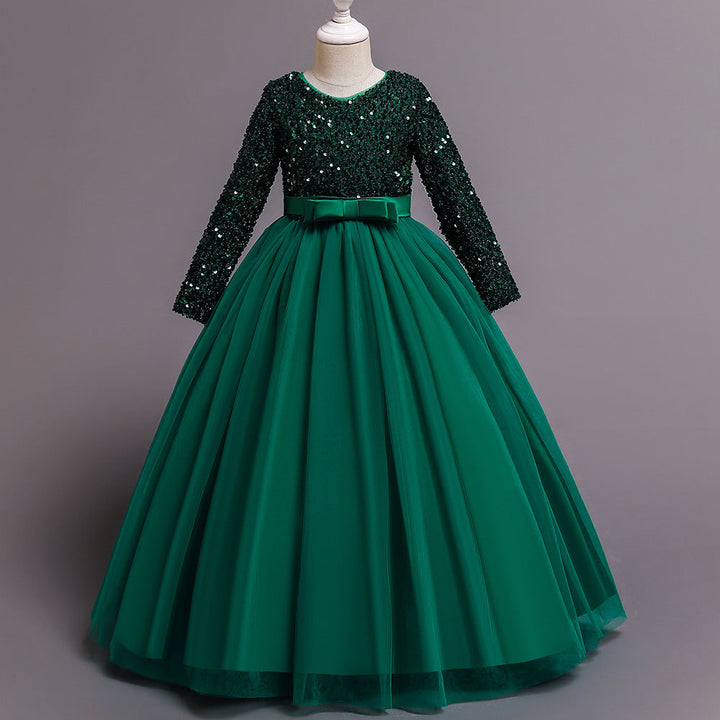 Sea Dragon Dreams girls' emerald green party dress with long sequin sleeves and a full tulle skirt with a bow waist.