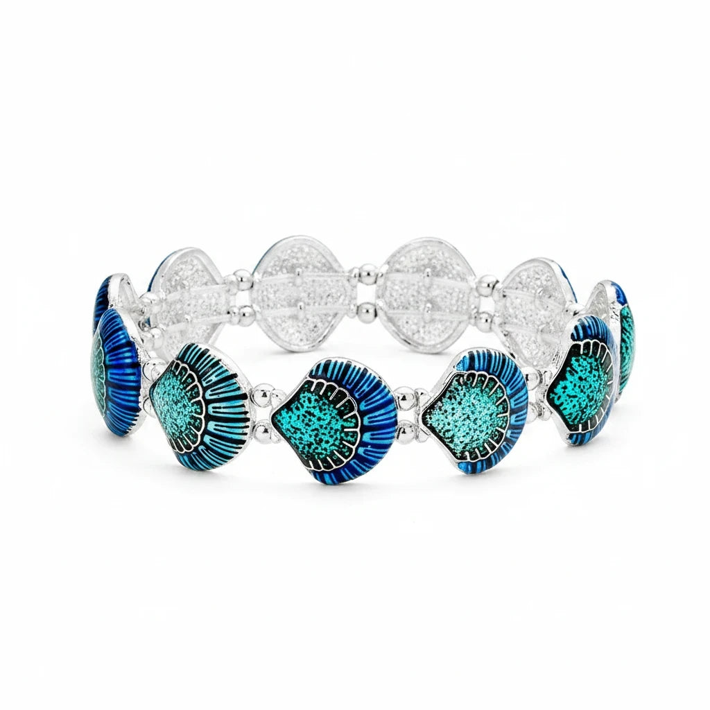 Sea Dragon Dreams enamel shell stretch bracelet featuring vibrant blue and turquoise coastal shell charms on metal.