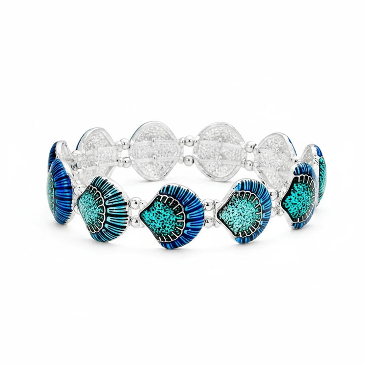 Sea Dragon Dreams enamel shell stretch bracelet featuring vibrant blue and turquoise coastal shell charms on metal.