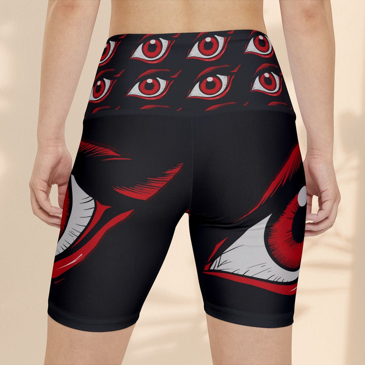 Sea Dragon Dreams women's black workout shorts with a red and white eye pattern print, made from 100% polyester.