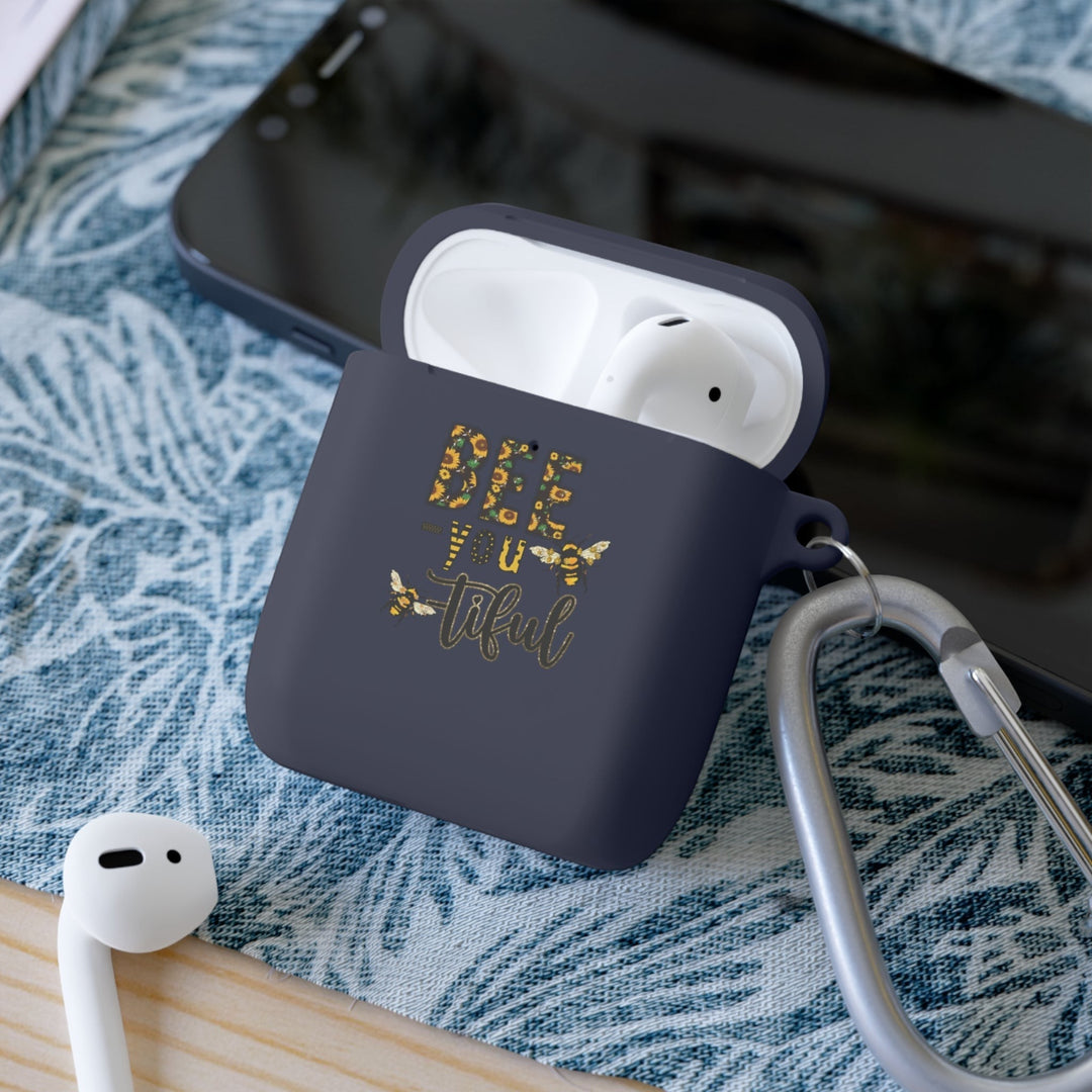 Sea Dragon Dreams Bee-You-Tiful floral AirPods case in dark blue TPU with a bee graphic and metal carabiner.