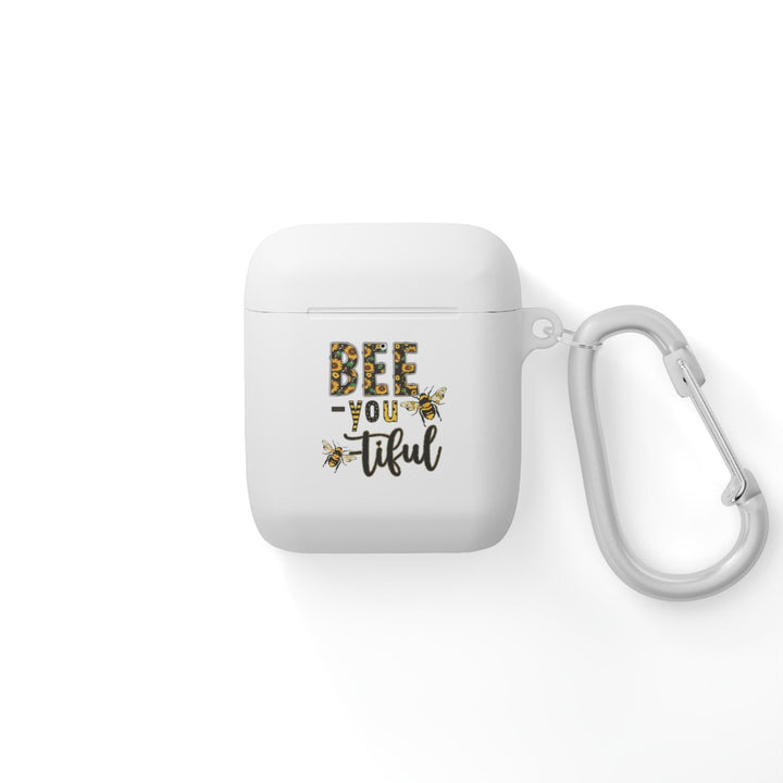 Sea Dragon Dreams white TPU AirPods case with Bee-You-Tiful floral bee graphic and included metal carabiner