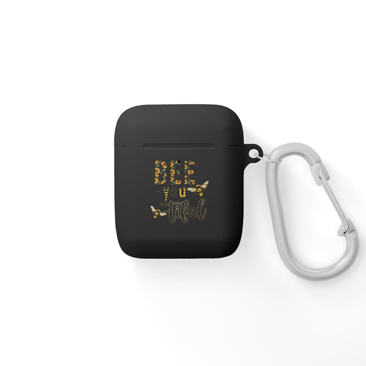Sea Dragon Dreams black TPU AirPods case with Bee-You-Tiful floral bee design and a silver metal carabiner clip.