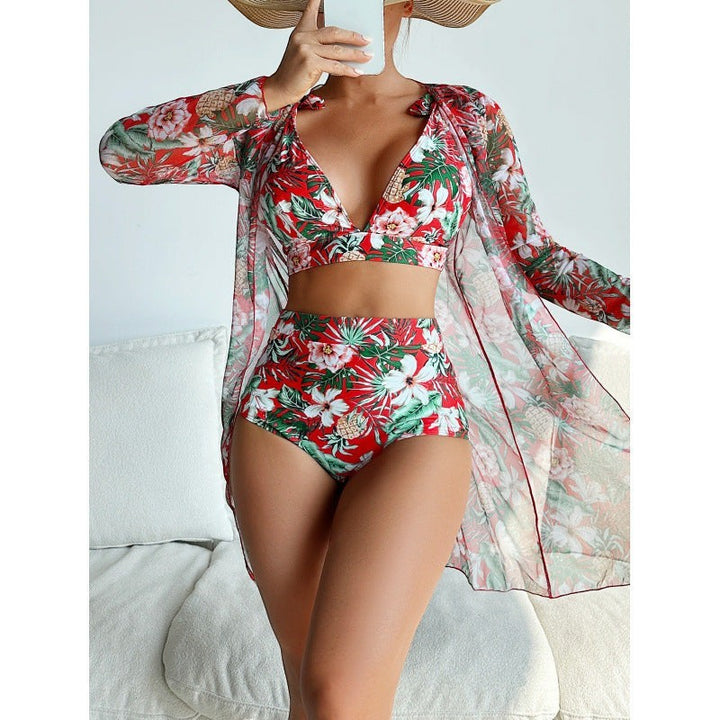 Sea Dragon Dreams 3-piece bikini set featuring a red tropical floral print, high-waisted bottoms, and sheer cover-up.