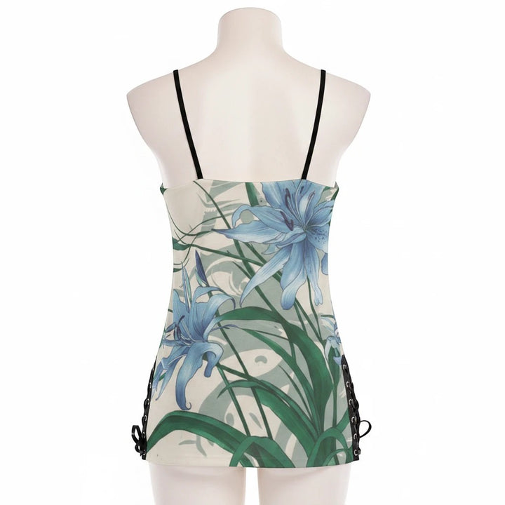 Sea Dragon Dreams cami dress featuring a blue lily floral print, lace-up side details, and black straps on a mannequin.