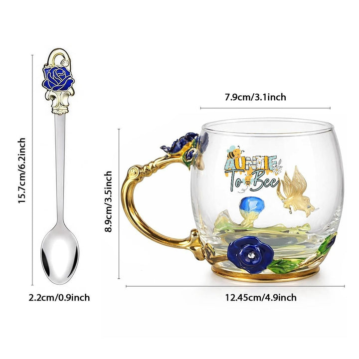 Sea Dragon Dreams Aunt To Be glass mug with enamel floral details, gold handle, and matching rose-topped spoon.