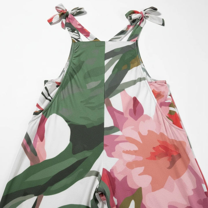 Sea Dragon Dreams floral print jersey jumpsuit with tie-shoulder straps, perfect for casual summer resort wear.