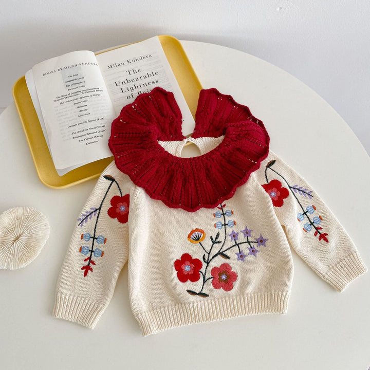 Sea Dragon Dreams baby girl knit blouse in apricot white with red ruffled collar and colorful floral embroidery