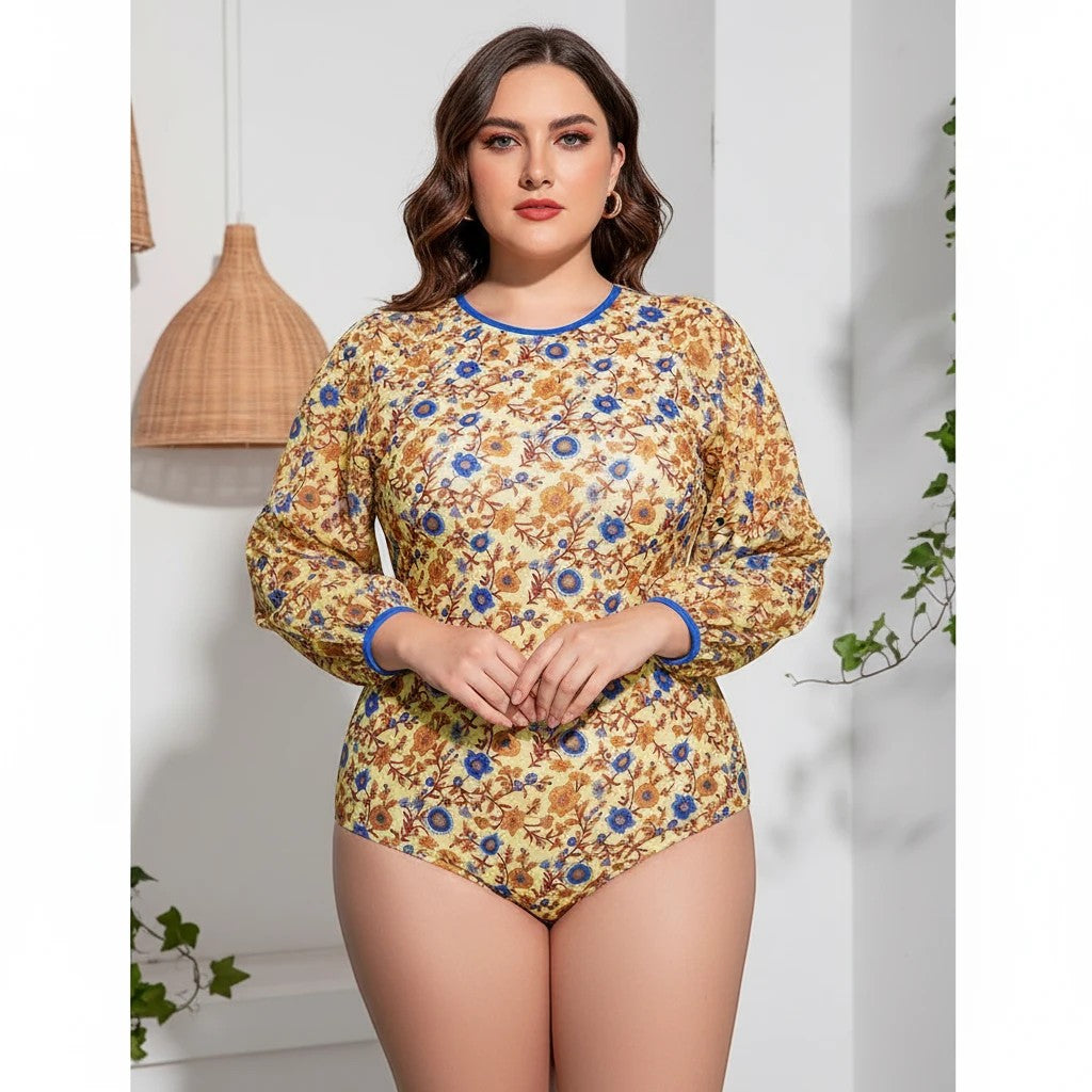 Sea Dragon Dreams plus size long sleeve one-piece swimsuit in yellow floral print with blue trim details