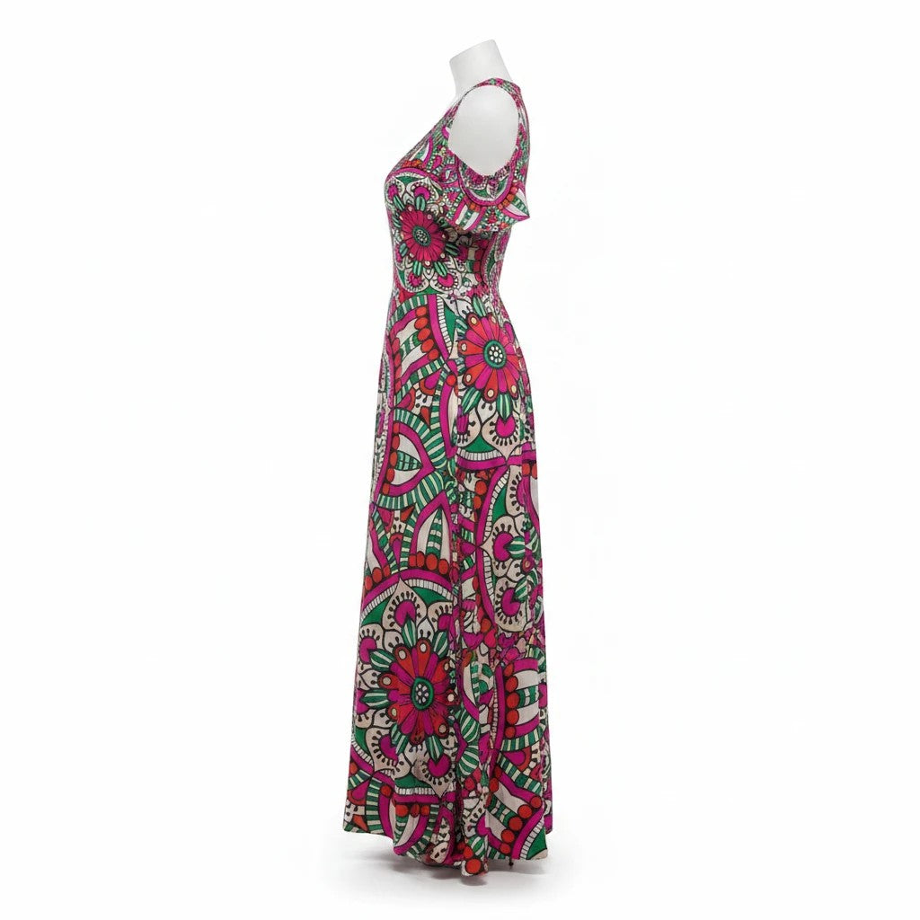 Sea Dragon Dreams off-shoulder maxi dress with a vibrant pink and green floral mandala pattern on a mannequin