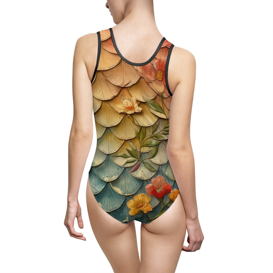 Sea Dragon Dreams vintage floral one-piece swimsuit with a mermaid scale pattern and scoop back, worn by a model.