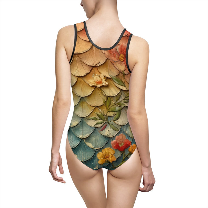 Sea Dragon Dreams vintage floral one-piece swimsuit with a mermaid scale pattern and scoop back, worn by a model.