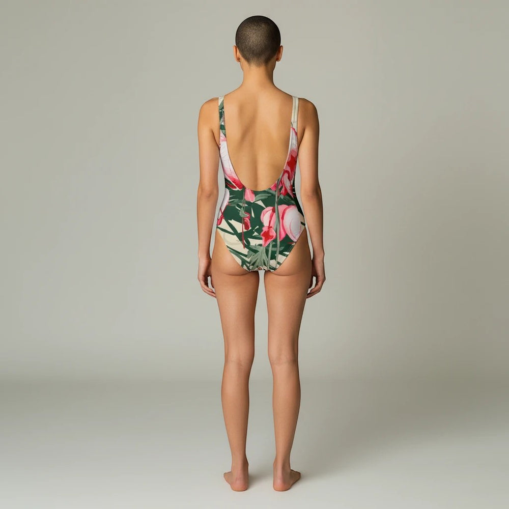 Sea Dragon Dreams floral print one-piece swimsuit with a low scoop back, shown from the back on a model.